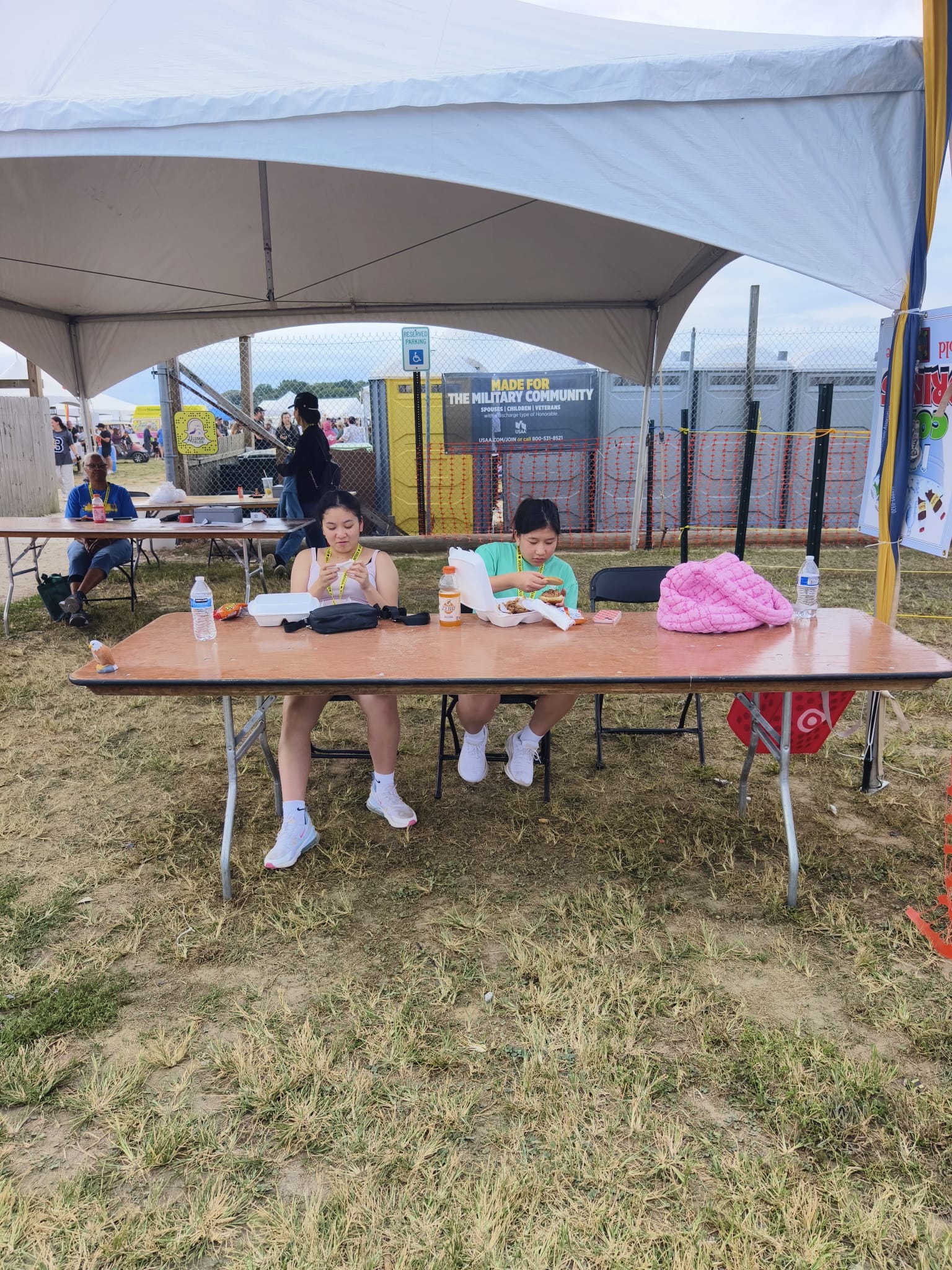 Vivian and Cindy enjoying PowWow food